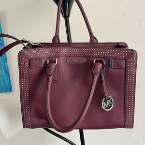Michael Korrs Plum color studded leather bag